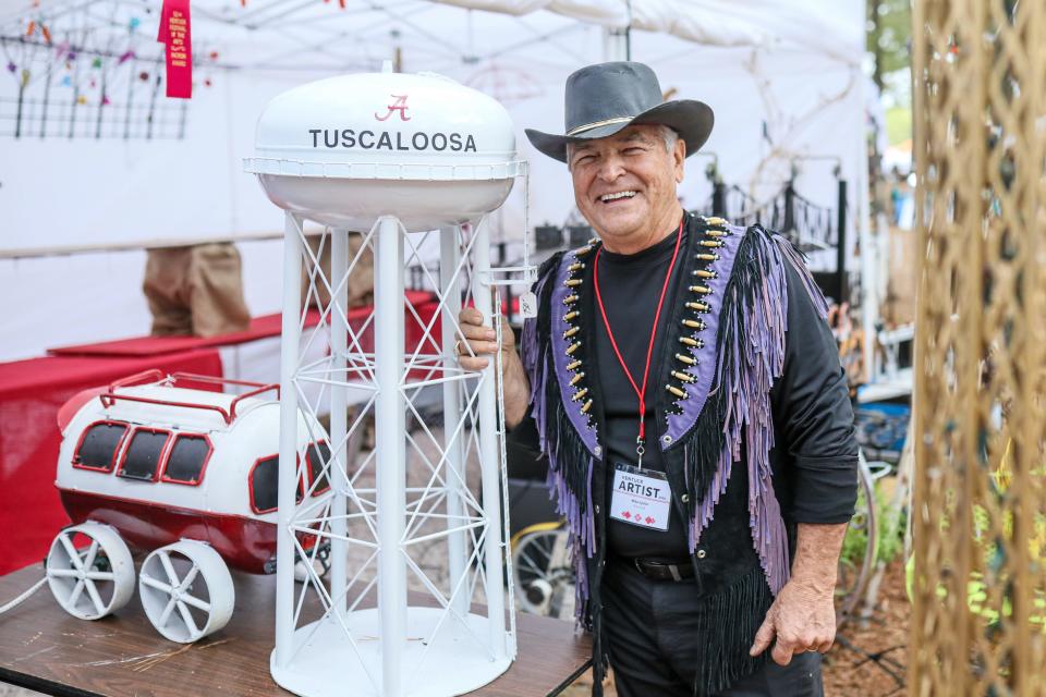 Mike Spiller displays his work at the Kentuck Festival at Kentuck Park in Northport Sunday, Oct. 15, 2023.