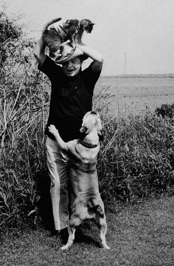 truman capote with his cat and dog