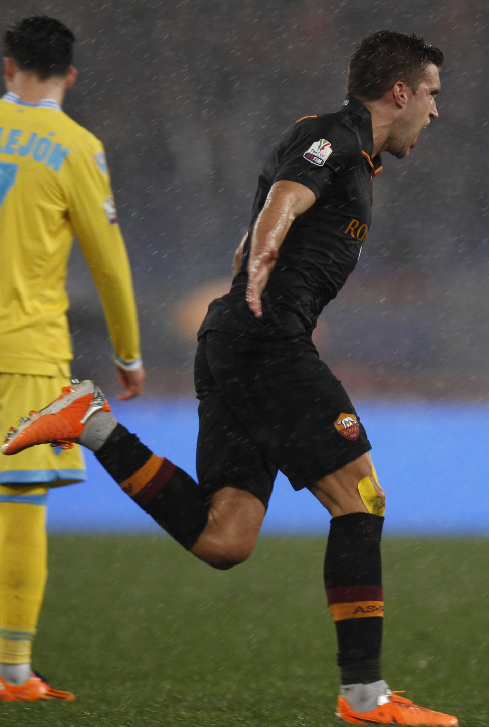 AS Roma midfielder Kevin Strootman celebrates after scoring during an Italian Cup, semifinal first leg match, between AS Roma and Napoli at Rome's Olympic stadium, Wednesday, Feb. 5, 2014. (AP Photo/Alessandra Tarantino)