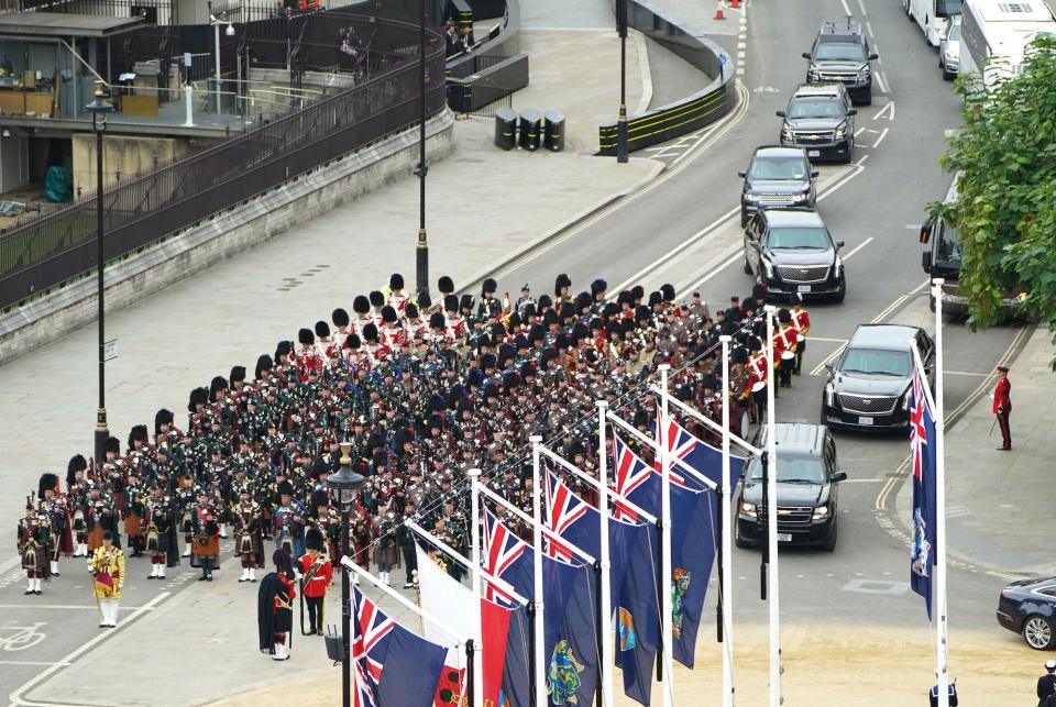 President Joe Biden's motorcade approaches Queen Elizabeth II's funeral.