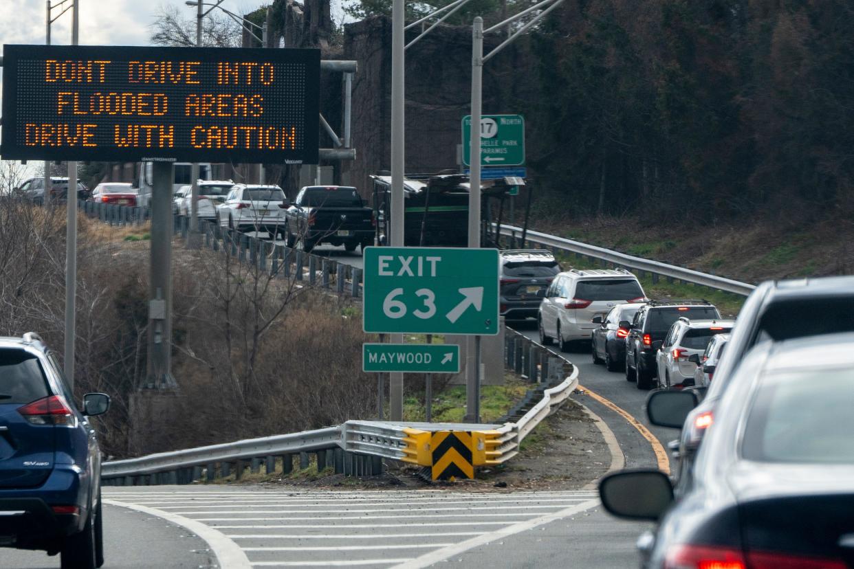 Jan 10, 2024; Hackensack, NJ, USA; A sign on Route 80 East near exit 63 warns of flooding on Wednesday.