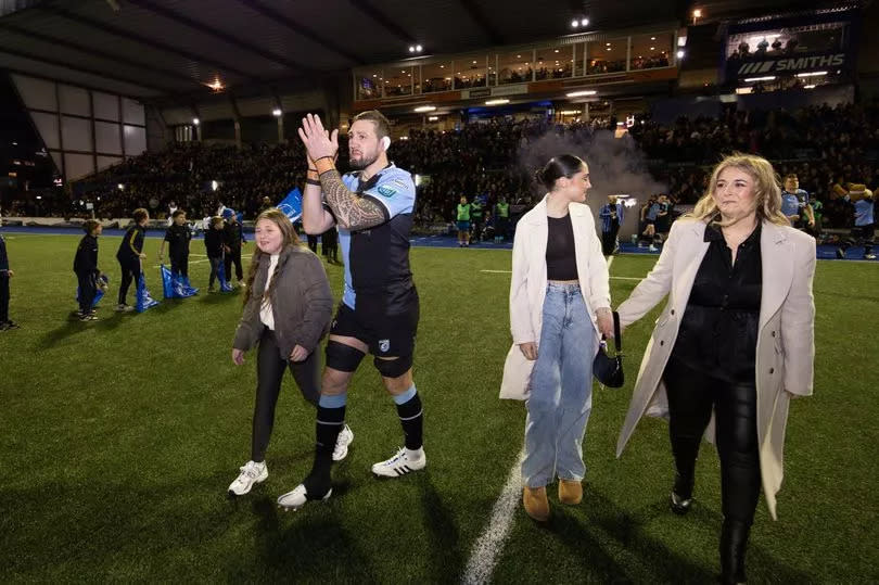 Josh Turnbull walks out with his family ahead of his 200th match for Cardiff -Credit:Gareth Everett/Huw Evans Agency