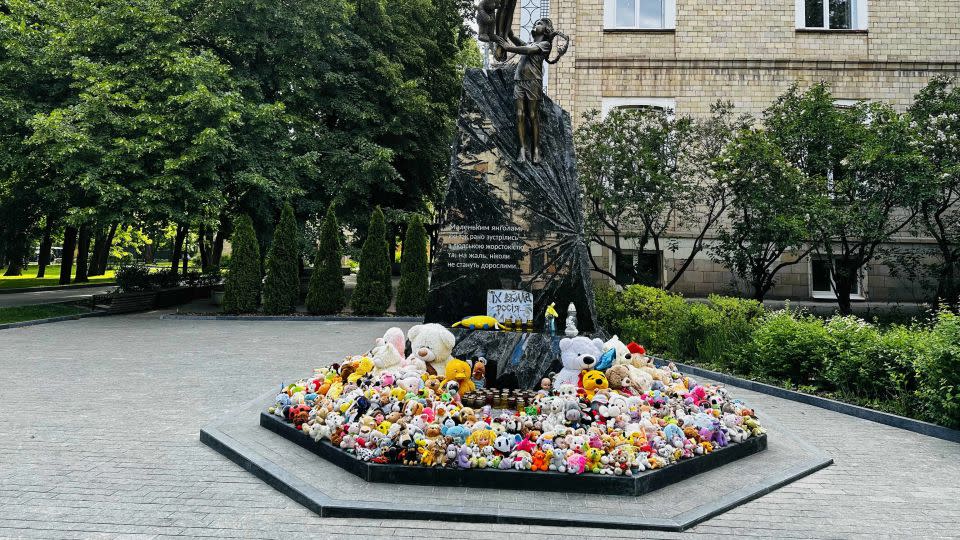 This monument is dedicated to children killed during the war. The sign reads: "They were killed by Russia." - Daria Tarasova-Markina/CNN