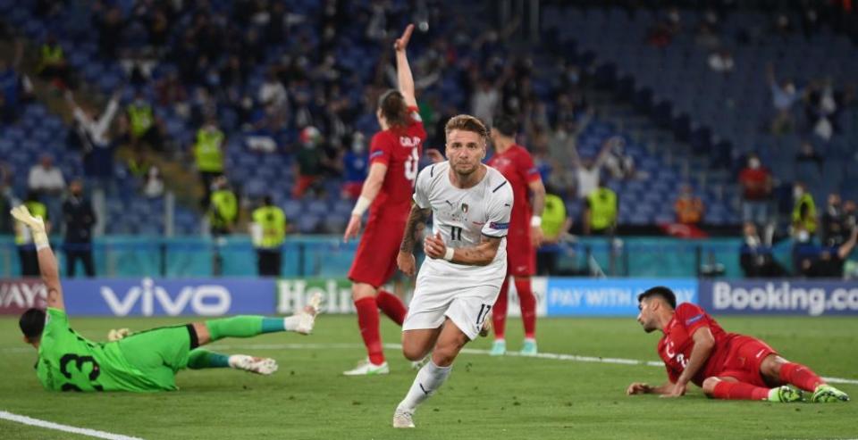 Ciro Immobile celebrates after putting Italy 2-0 ahead.