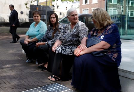 Members of "Mothers of Srebrenica" association wait during the ruling on the case brought by relatives of the victims of the 1995 Srebrenica massacre, at the Dutch high court in The Hague