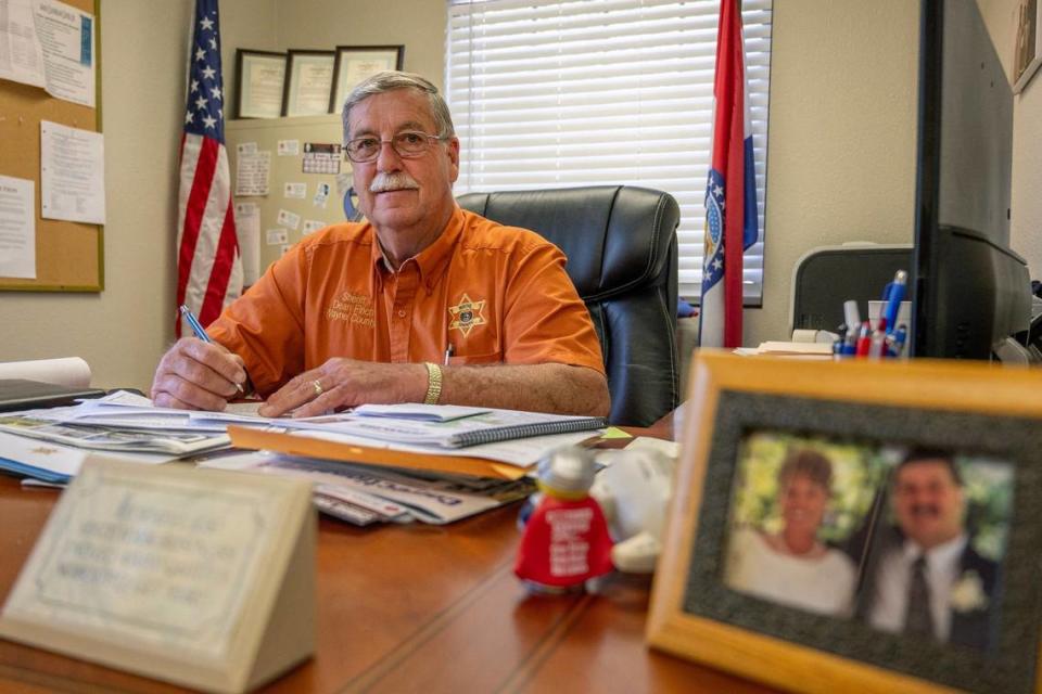 Sheriff Dean Finch sits behind his desk at the Wayne County Sheriff’s Office in Greenville, Missouri.