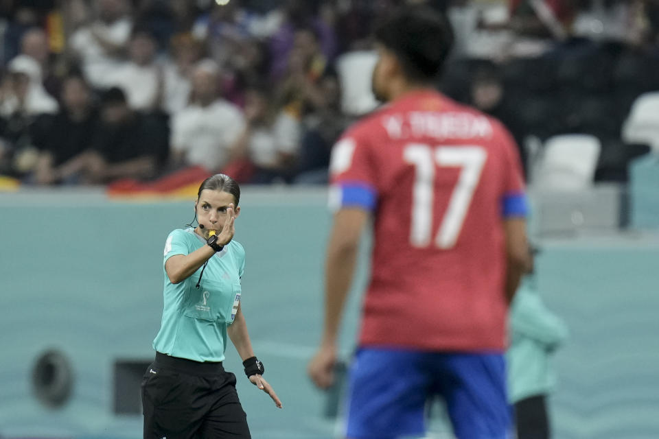 Referee Stephanie Frappart blows the whistle during the World Cup group E soccer match between Costa Rica and Germany at the Al Bayt Stadium in Al Khor , Qatar, Thursday, Dec. 1, 2022. (AP Photo/Hassan Ammar)