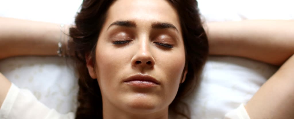 Woman Asleep On Bed