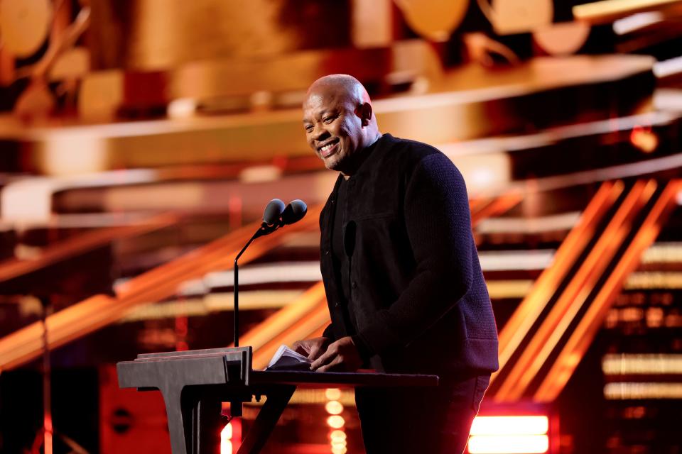 Dr. Dre introduces Inductee Eminem onstage during the 37th Annual Rock & Roll Hall of Fame Induction Ceremony at Microsoft Theater on Nov. 5, 2022 in Los Angeles, California.