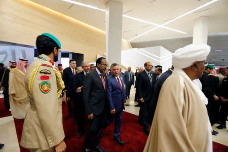 Arab leaders arrive for the group photo before the start of 29th Arab Summit in Dhahran, Saudi Arabia April 15, 2018. REUTERS/Hamad I Mohammed