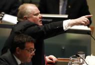 Toronto Mayor Rob Ford reacts during a special council meeting at City Hall in Toronto November 18, 2013. REUTERS/Aaron Harris (CANADA - Tags: POLITICS)