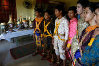 Dancers get ready before a performance of masked theatre known as Lakhon Khol which was recently listed by UNESCO, the United Nations' cultural agency, as an intangible cultural heritage, along with neighbouring Thailand's version of the dance, known as Khon at the Wat Svay Andet buddhist temple in Kandal province, Cambodia, December 16, 2018. REUTERS/Samrang Pring