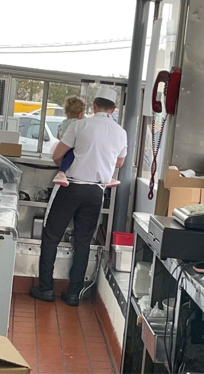 Steven Schneider is a dad now, too. He's holding his daughter MJ at   Leon's Frozen Custard, 3131 S. 27th St.