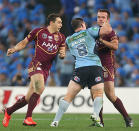 Blues captain Paul Gallen throws some punches at Nate Myles.