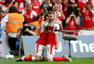 Arsenal's Aaron Ramsey (R) celebrates with teammate Hector Bellerin after scoring their second goal against Chelsea in English FA Cup final at Wembley stadium in London on May 27, 2017