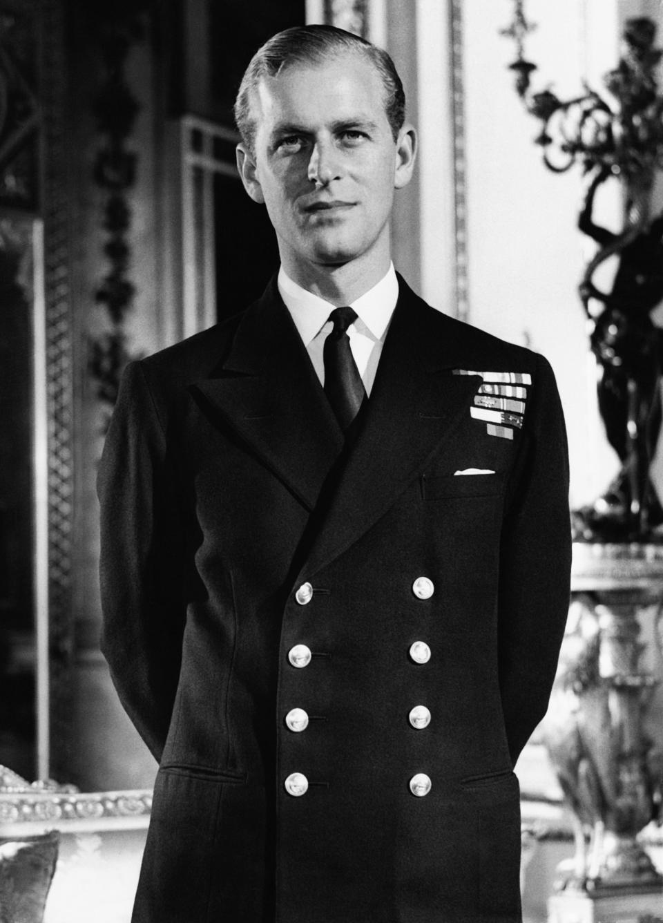 Philip Mountbatten in the White Drawing Room at Buckingham Palace in London, in October 1947.<span class="copyright">Gamma-Keystone France/Getty Images</span>