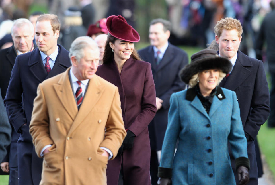 <p>Kate experienced her first Christmas as a royal at Sandringham in 2011, when she wore an aubergine coat by “an independent British designer,” with a matching hat from Jane Corbett. (Getty) </p>