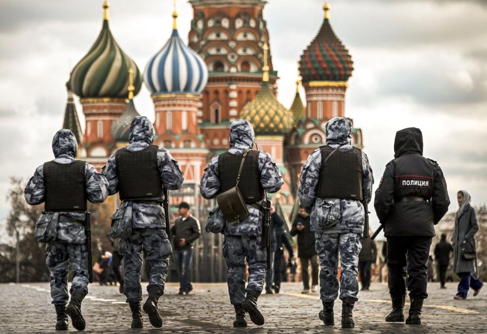 Russian police and National Guard (Rosgvardia) servicemen patrol Red Square in central Moscow.