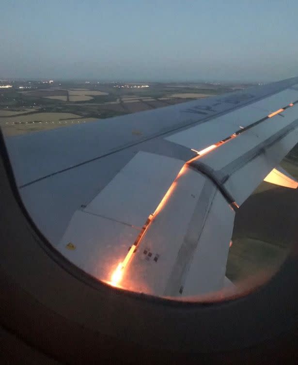 Flames were seen coming out of the Russian Airlines Airbus engine that the Saudi Arabian team rode on. (Image: via @AhmedMashaly24/Twitter)