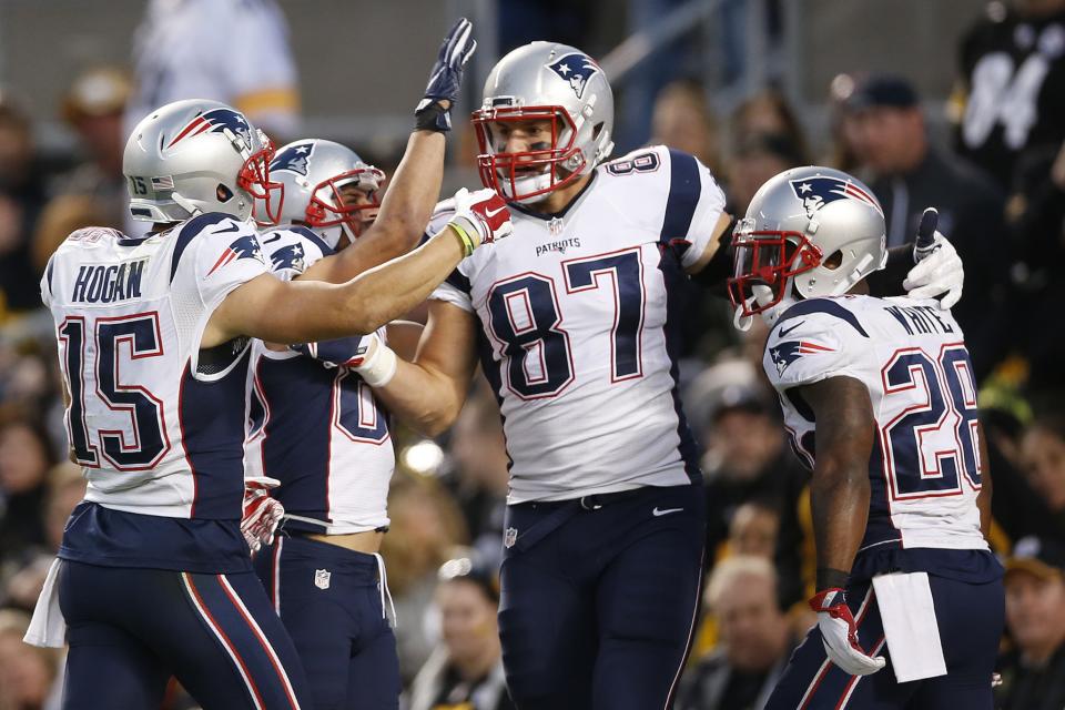 Ribald Rob Gronkowski celebrates his touchdown with teammates (AP)