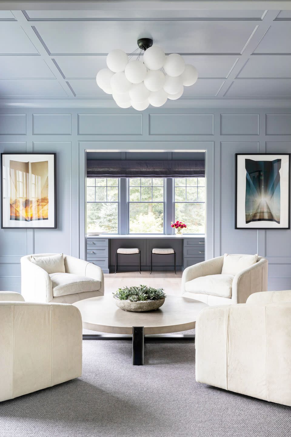 <p>Simply paint the whole room one color for a more polished and cohesive look. It had a cocooning effect that a plain ceiling with painted walls simply can't achieve. Here, Chango & Co. used a soft steel blue shade.</p>