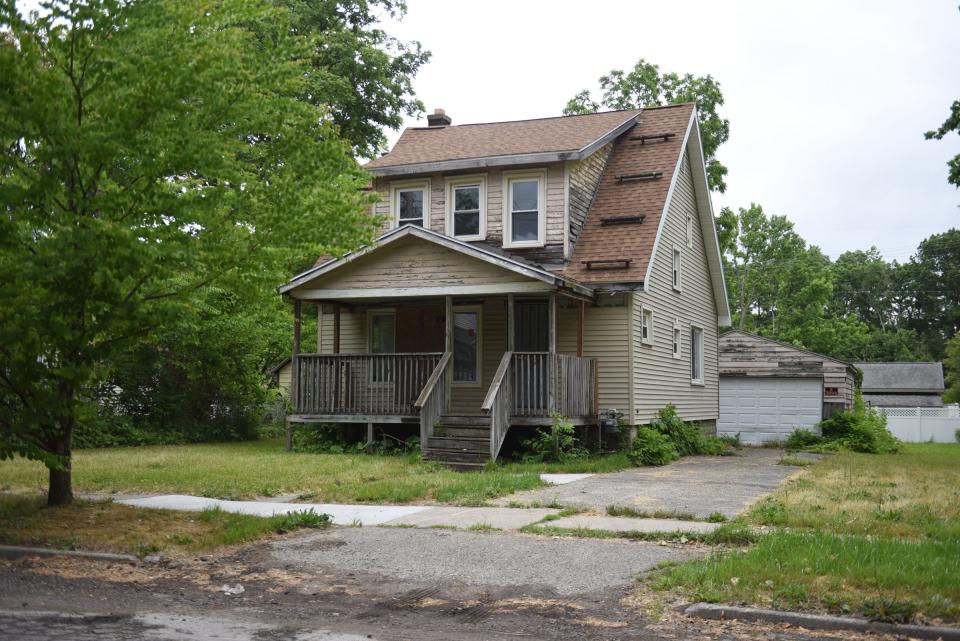 A home at 1115 Regent St. in Lansing is seen on Monday, June 12, 2023. The home has been red-tagged since Nov. 29, 2007, and is one of many properties deemed a problem by city officials.