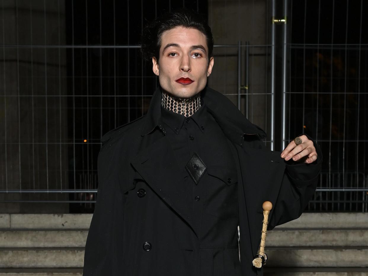 Ezra Miller wearing black.