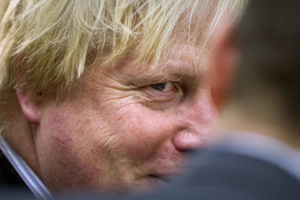 FILE - British Foreign Minister Boris Johnson participates in the Meeting of the Ministers of the Global Coalition on the Defeat of ISIS, Wednesday, March 22, 2017, at the State Department in Washington. The moving vans have already started arriving in Downing Street, as Britain's Conservative Party prepares to evict Johnson. Debate about what mark he will leave on his party, his country and the world will linger long after he departs in September. (AP Photo/Cliff Owen, File)