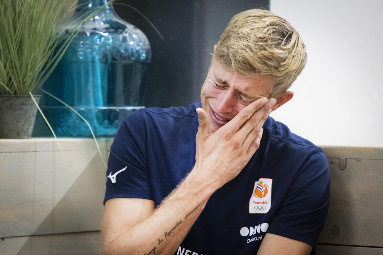 Netherlands' volleyball player Steven van de Velde gestures as he addresses media representatives during a press conference at the European Beach Volleyball Championships in The Hague on August 13, 2024, following his participation in the 2024 Paris Olympic Games.