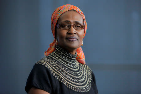 FILE PHOTO: Oxfam International Executive Director Winnie Byanyima poses for a portrait following an interview in New York, NY, U.S., February 11, 2018. REUTERS/Andrew Kelly