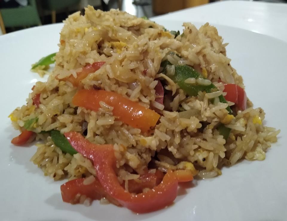 Thai basil fried rice with chicken is served at Cilantro Thai & Sushi Restaurant in downtown Akron.