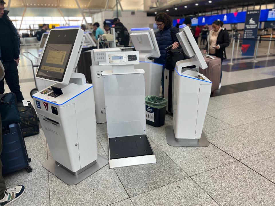 Delta's Terminal 4 self-service kiosks and bag weight.