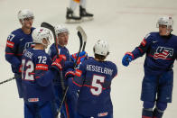 Unted States' Brady Tkachuk celebrates with teammates after scoring his side's opening goal during the preliminary round match between United States and Germany at the Ice Hockey World Championships in Ostrava, Czech Republic, Saturday, May 11, 2024. (AP Photo/Darko Vojinovic)