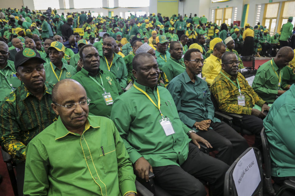 Party members attend the national congress of the ruling Chama cha Mapinduzi (CCM) party in Dodoma, Tanzania Saturday, July 11, 2020. Tanzania's ruling party on Saturday nominated President John Magufuli to run for a second five-year term, while opposition parties and human rights groups demand an independent electoral body to oversee the October vote. (AP Photo)