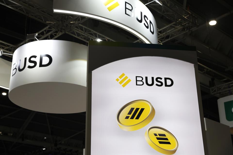 Signage for Binance's BUSD stablecoin at the Singapore FinTech Festival. Photographer: Lionel Ng/Bloomberg