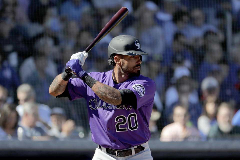 Colorado Rockies' Ian Desmond during the first inning of a spring training baseball game against the Chicago Cubs, Tuesday, Feb. 25, 2020, in Mesa, Ariz. Desmond announced Sunday, Feb. 21, 2021 he is opting out for a second straight season. Desmond announced on his Instagram account that his “desire to be with my family is greater than my desire to go back and play baseball under these circumstances. I'm going to train and watch how things unfold.” He added “for now" in his statement to opt out, leaving the door open for a possible return. (AP Photo/Matt York, file)