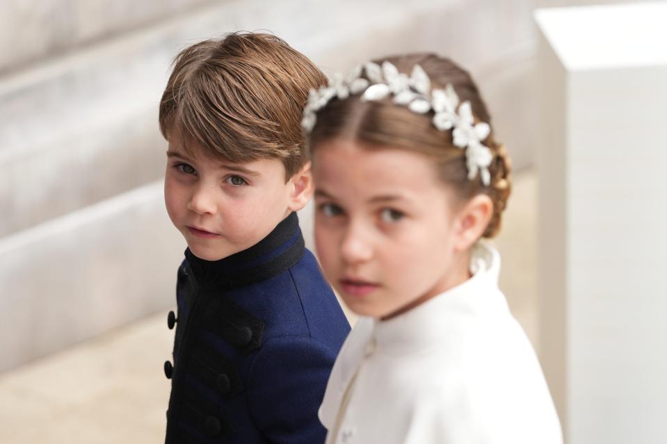Prince Louis and Princess Charlotte arrive for the coronation of King Charles III.