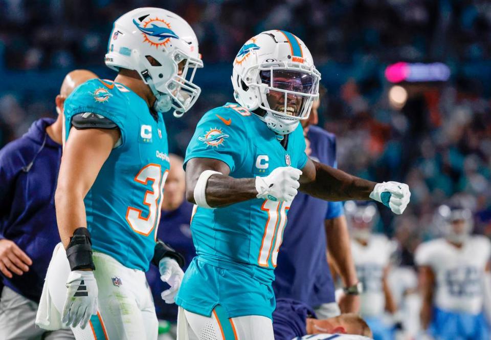 Miami Dolphins wide receiver Tyreek Hill (10) reacts after catching a pass in the third quarter against the Tennessee Titans at Hard Rock Stadium in Miami Gardens, Florida on Monday, December 11, 2023.