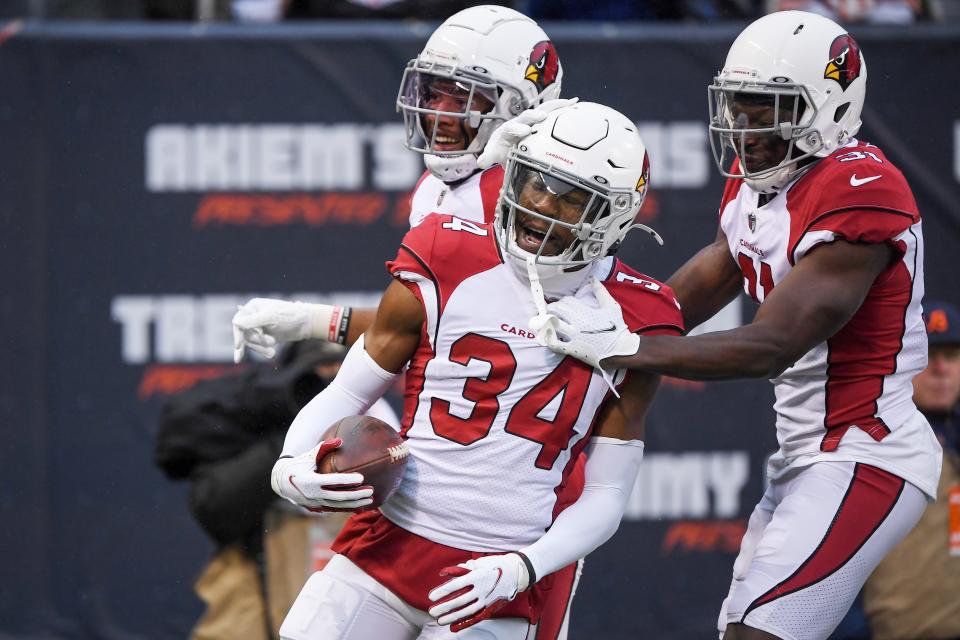 Dec 5, 2021; Chicago, Illinois, USA; Arizona Cardinals free safety Jalen Thompson (34) reacts after his interception in the first half against the Chicago Bears at Soldier Field. Mandatory Credit: Quinn Harris-USA TODAY Sports