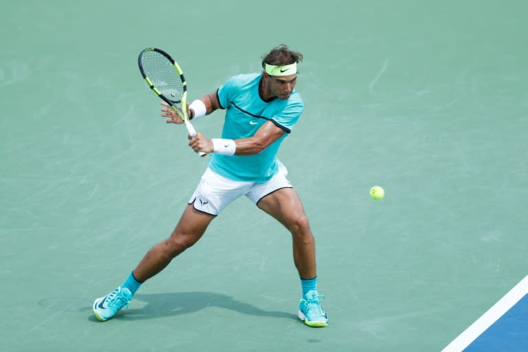 Rafael Nadal of Spain hits a return to Borna Coric of Croatia, in Mason, Ohio, on August 18, 2016