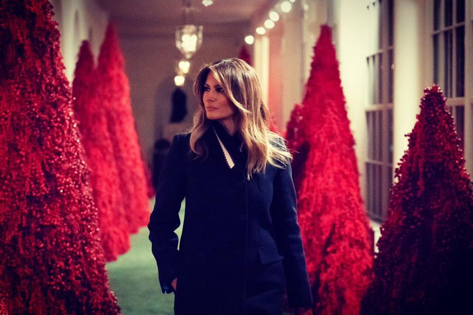 First lady Melania Trump walks through the East colonnade lined with topiary trees during the 2018 Christmas Press Preview at the White House in Washington, D.C., Monday, Nov. 26, 2018. (Photo: Melania Trump via Twitter)