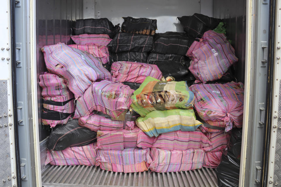 In this photo supplied by the New Zealand police, a shipment of cocaine found floating on the surface of the Pacific Ocean sits stacked in a container in Auckland, New Zealand, Tuesday, Feb. 7, 2023. New Zealand police said Wednesday they found more than 3 tons of cocaine floating in a remote part of the Pacific Ocean after it was dropped there by an international drug-smuggling syndicate. (NZ Police via AP)