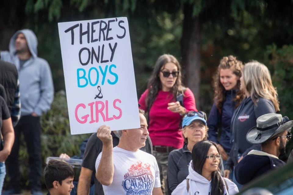 Protests against SOGI in B.C. schools, including this one in September, have turned disruptive on at least 18 occasions since the school year began, according to the premier, and are prompting the NDP government to propose a new law to limit protests outside schools. (Ben Nelms/CBC - image credit)