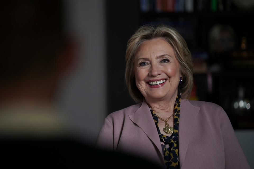 Former Secretary of State Hillary Clinton laughs as she speaks with USA TODAY about the Hulu docuseries "Hillary" directed by Nanette Burstein.