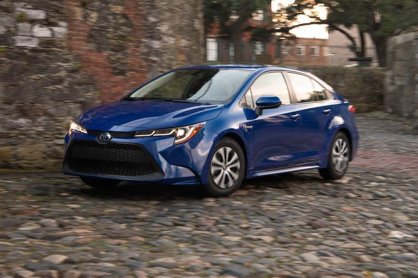 This undated photo provided by Toyota shows the 2020 Toyota Corolla Hybrid sedan. Car shoppers seeking high fuel economy have two particularly intriguing choices this year: the Honda Insight and the Toyota Corolla Hybrid. Both deliver an EPA-estimated 52 mpg in combined city and highway driving, which is among the best of any vehicle on sale. (Toyota via AP)