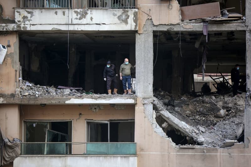 Lebanese forensics work on collecting evidence from the destroyed office of Hamas which was attacked by Israel on 02 January, killing Hamas leader Saleh al-Arouri and six others in Beirut southern suburb. Marwan Naamnai/dpa