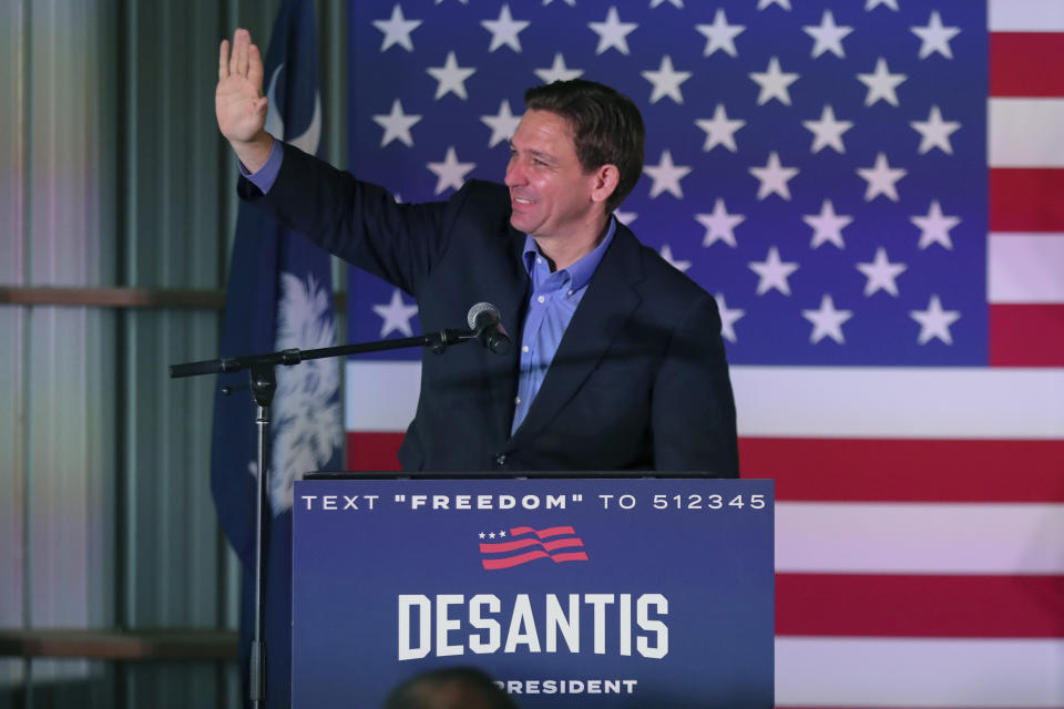 Republican presidential candidate Florida Gov. Ron DeSantis waves to his supporters as he takes the stage during a campaign event, Friday, June 2, 2023, in Lexington, S.C. (AP Photo/Artie Walker Jr.)