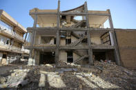 A damaged building is seen following an earthquake in Sarpol-e Zahab county in Kermanshah, Iran. REUTERS/Tasnim News Agency