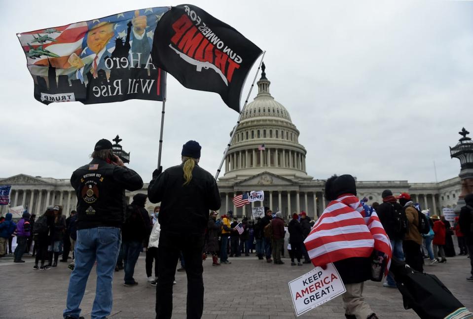 <div class="inline-image__caption"><p>Supporters of Donald Trump hold a rally outside the US Capitol on January 6, 2021.</p></div> <div class="inline-image__credit">OLIVIER DOULIERY/AFP via Getty Images)</div>