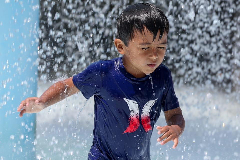 A child plays in Hurricane Alley Waterpark's Captain's Kid Cove Saturday, May 28, 2022.